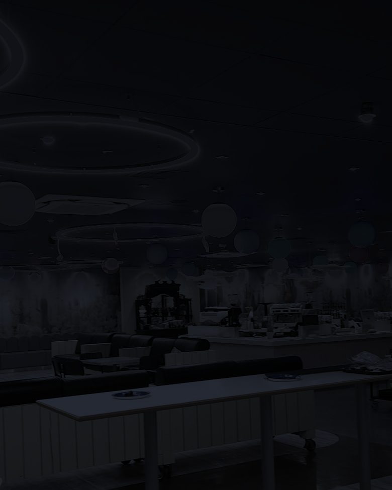 Café interior with LED ring pendants and colour-change globe lights